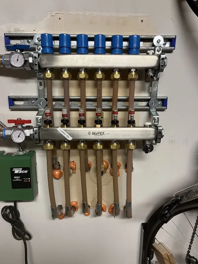 Plumber performing Water Heater Repair at a residential property in Youngtown